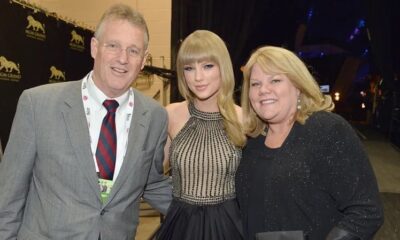 Taylor Swift with her parents in 2013
